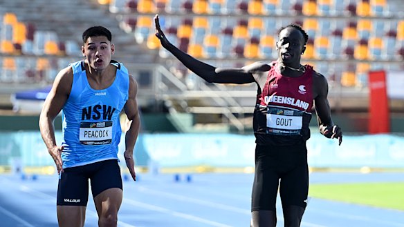 Gout Gout waves during his run in the 100 metres in the Australian Athletics junior championships.