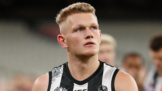 MELBOURNE, AUSTRALIA - JULY 03: Adam Treloar of the Magpies looks dejected after a loss during the 2020 AFL Round 05 match between the Collingwood Magpies and the Essendon Bombers at the Melbourne Cricket Ground on July 03, 2020 in Melbourne, Australia. (Photo by Michael Willson/AFL Photos via Getty Images) AFL TRADE