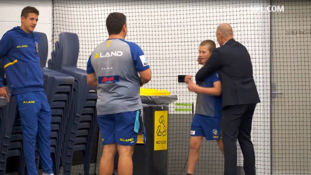 Jake Arthur (left) has some fun with his younger brother and father inside the Eels dressing rooms before a game back in 2019.