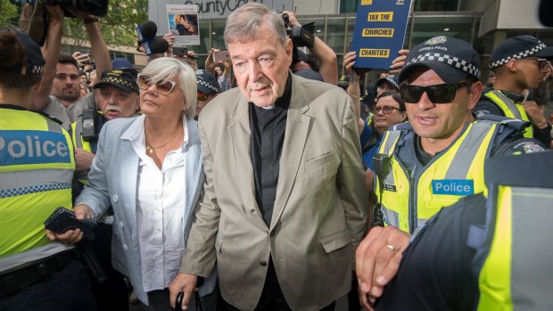 Cardinal George Pell pictured leaving the County Court where was found guilty of historical sexual offences.