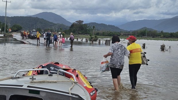 Cairns residents are evacuated after Cyclone Jasper ravaged parts of far north Queensland in December.