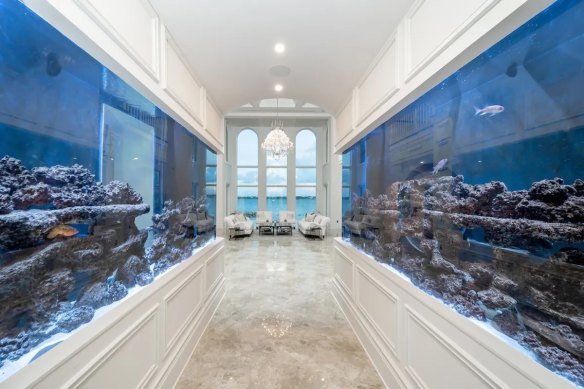 Built-in fish tanks mirror the sea outside.