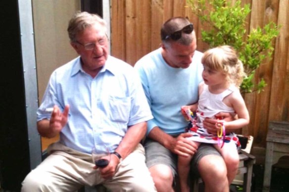 Elliott with his father John and daughter Ava, Christmas 2013.