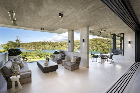 The three-level residence was designed by architect Shaun Lockyer and has interiors by Justine Hugh-Jones.