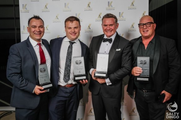 Mark Llewellyn (right) with Seven’s Spotlight team at an awards function in 2022. From the left are John Varga, Taylor Auerbach and Michael Usher.