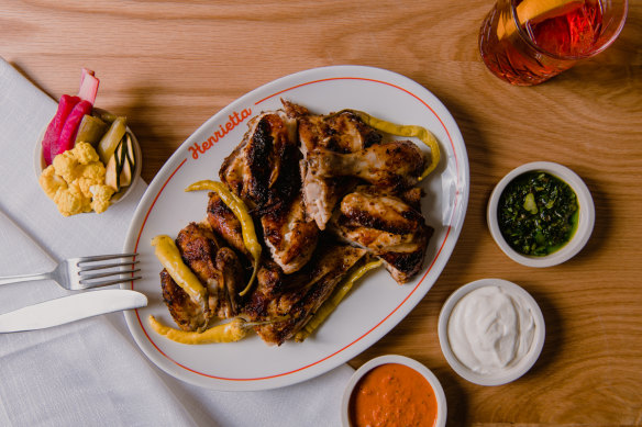 Henrietta’s charcoal chicken with condiments, bread and pickles. 