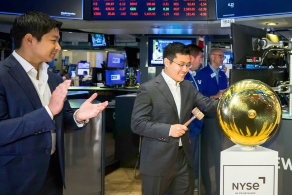 Jasper Lau, left, and FiscalNote CEO Tim Hwang at the New York Stock Exchange to mark the company’s public listing on August 4. 