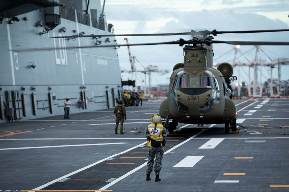 The HMAS Adelaide is carrying CH-47 Chinook heavy-lift helicopters to Tonga to deliver contactless aid supplies to aid the tsunami recovery effort. 