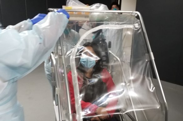 Bianca was transported to hospital in a a wheelchair enclosed in plastic. 
