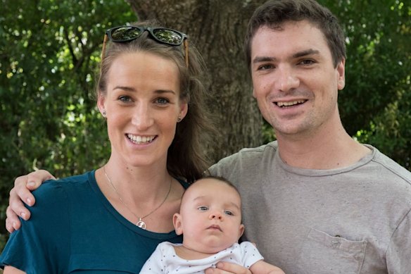 Jacomb and her brother Braden Simmons, with Jacomb’s first child. Simmons was shunned by the church for emailing his sister. This picture was taken after he was out of the Brethren.