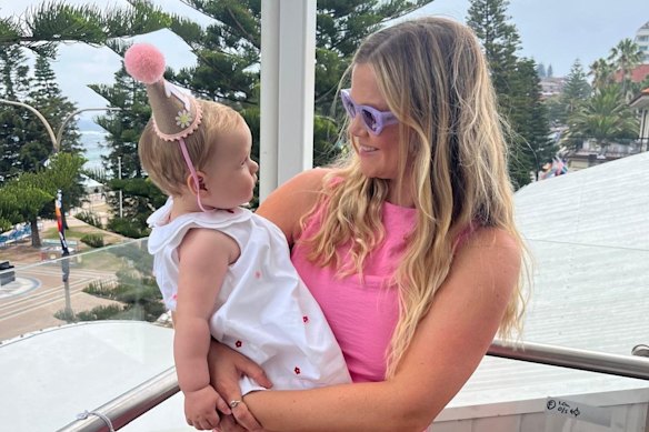 Leah Stewart, pictured with her daughter before she was attacked by a great white shark at Coogee in June.
