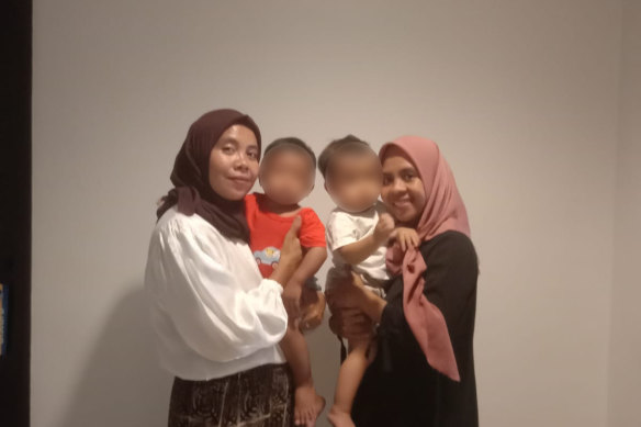 Indonesian women Siti Mauliah and Dian Hartono have raised each other’s son for the past year as a result of alleged negligence by the hospital where they gave birth.