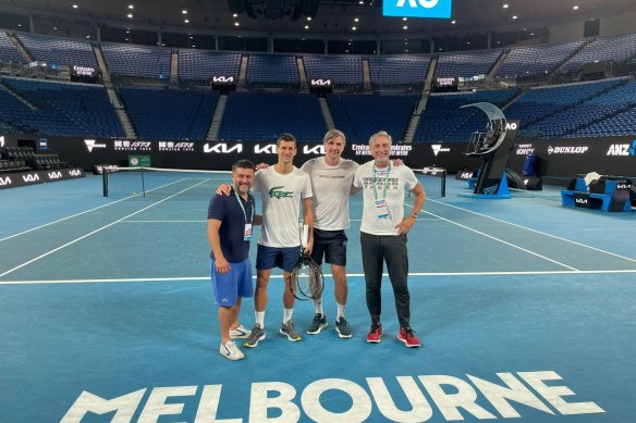 Novak Djokovic at Rod Laver Arena on Monday night with his team, including coach Goran Ivanisevic to Djokovic’s right.