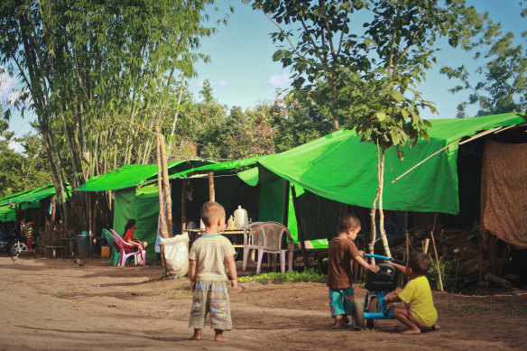 Children playing at a “displacement” camp in Kayah state as Myanmar descends deeper into chaos under military rule.