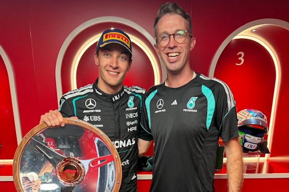 Australian Kim Keedle with 2026 Melbourne Grand Prix winner George Russell of Mercedes.