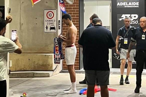 Novak Djokovic gave away his clothes as souvenirs to adoring fans after his Adelaide International win. 