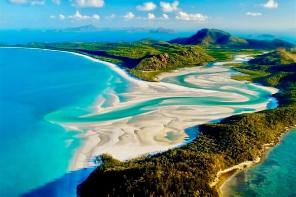 The swirling white silica sand and turquoise waters of Whitsunday Island.