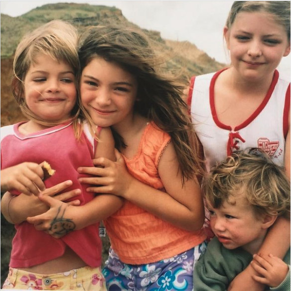 Lorde  (centre) as a child  with her siblings.