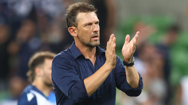 Popovic applauds the Victory fans at AAMI Park.