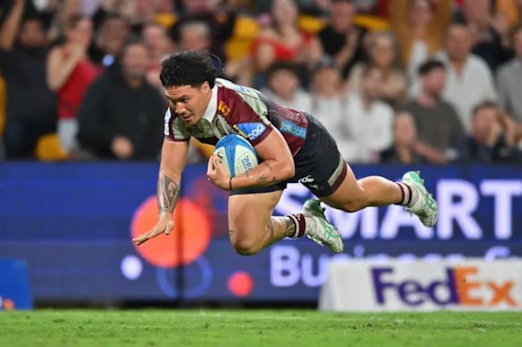 Dre Pakeho scores a try for the Reds.