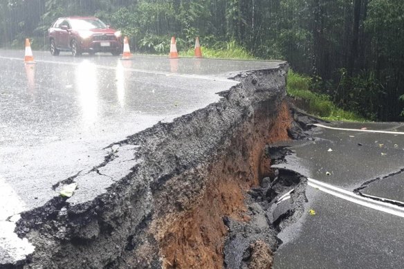 Severe damage to the Palmerston Highway after flooding caused by ex-tropical cyclone Jasper.