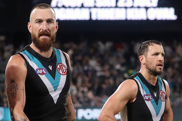 Veterans Charlie Dixon and Travis Boak are immersed in Port Adelaide’s premiership campaign.