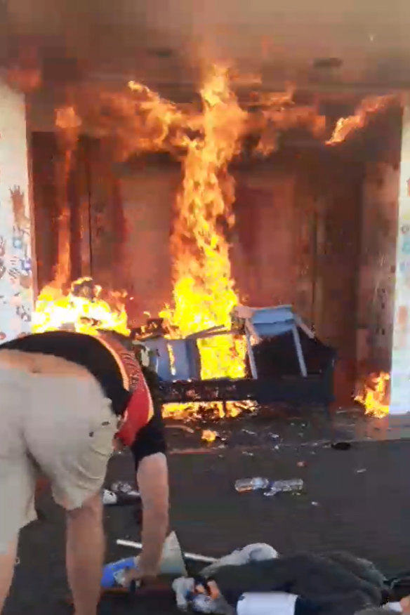 Fire damaging the front doors of Old Parliament House in January.