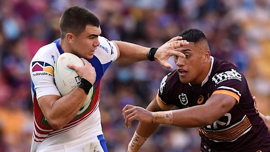 Jake Clifford is tackled during Saturday’s game in Brisbane.
