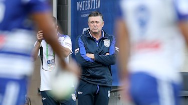 Dean Pay watches the Bulldogs prepare for their clash with the Dragons last season, just weeks before he was sacked by the club.