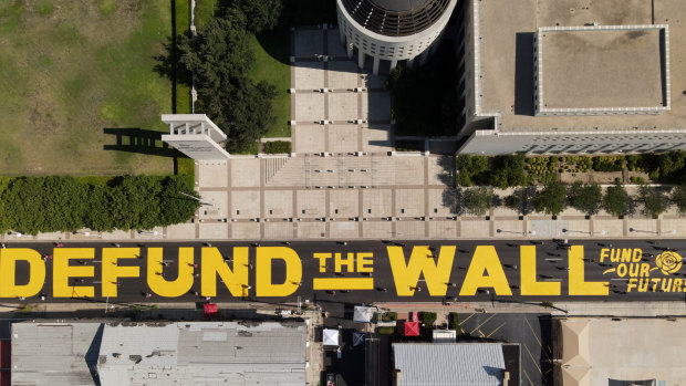 An aerial shot of a new "Defund The Wall" mural that was painted outside the Laredo federal courthouse.