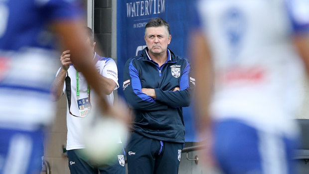 Dean Pay watches the Bulldogs prepare for their clash with the Dragons last season, just weeks before he was sacked by the club.