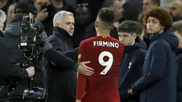 Tottenham manager Jose Mourinho has a word with Firmino at the end of the match.