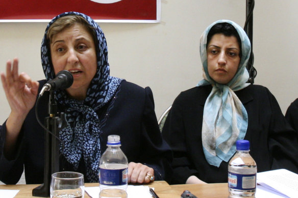 Prominent Iranian human rights activist Narges Mohammadi, right, listens to Iranian Nobel Peace Prize laureate Shirin Ebadi in Tehran in 2007.