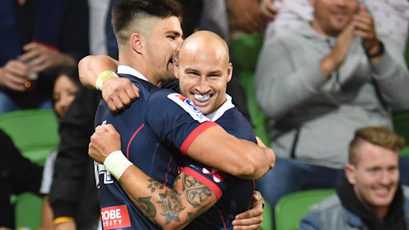 Jack Maddocks and Billy Meakes celebrate after Maddocks scored for the Rebels against the Brumbies at AAMI Park on Friday night.