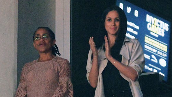 Meghan Markle, right, watches the closing ceremony of the Invictus Games with her mother  Ragland in Toronto, Canada, last year.