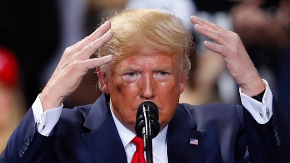 A visibly rattled US President Donald Trump raved and ranted at a rally in Battle Creek, Michigan, while the impeachment vote was taking place.