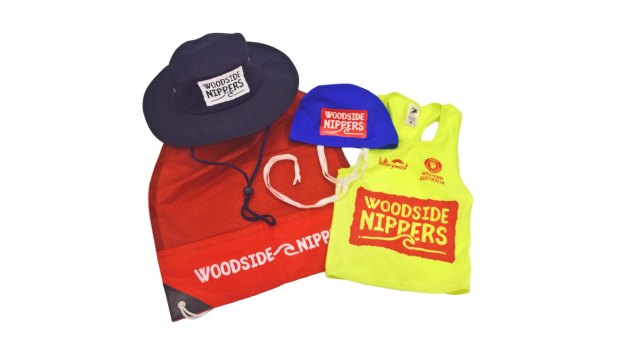Every junior lifesaver in WA gets a free uniform with Woodside’s logo.