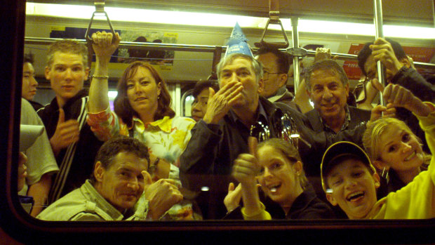 New Year's Eve revellers take a tram home.