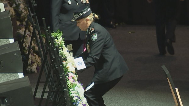 Queensland Police Commissioner Katarina Carroll lays a wreath.