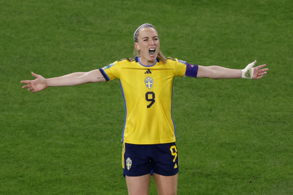 Kosovare Asllani celebrates after scoring for Sweden.