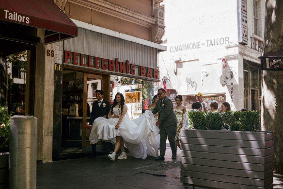 Sarah Pannell’s photo of a wedding passing Pellegrini’s in Bourke Street.