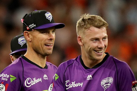Riley Meredith (right) is a millionaire after the IPL auction.