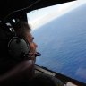 Royal New Zealand Airforce P-3K2-Orion aircraft co-pilot and Squadron Leader Brett McKenzie during the initial search for missing Malaysia Airlines flight MH370 in April.