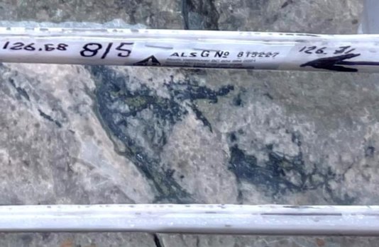 Half-core from Advance Metals’ first diamond hole at Yoquivo, from about 126.6 metres down-hole in the lower Pertenencia Vein, shows breccia infilled by silver-bearing sulphide mineralisation (black), which assayed 0.13m at 2250 grams per tonne silver and 17.2g/t gold.