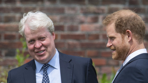 Earl Spencer, the brother of Princess Diana, with her son Prince Harry.