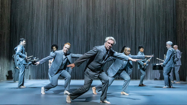 David Byrne (centre), and cast: the whole show is meticulously choreographed.