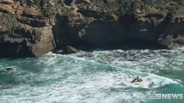 It's believed the 62-year-old man was swept into a sea cave.