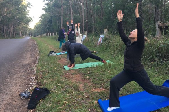 To get around COVID-19 lockdown restrictions, protesters took to yoga in a bid to stop the housing development.