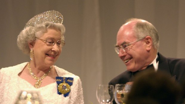 401615 01: Britains Queen Elizabeth II (L) chats with Prime Minister of Australia John Howard at a dinner at Festival Centre February 27, 2002 in Adelaide, Australia. The queen will formally open the Commonwealth Heads of Government Meeting March 2 at the resort town of Coolum, north of Brisbane. (Photo by Tony Lewis/Getty Images) -