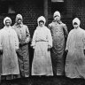 Dr Burnett Ham and his medical and nursing staff wore specially designed overalls and respirators when dealing with the sick.